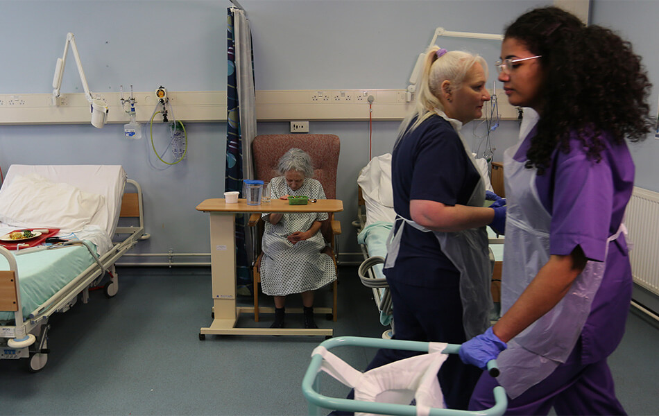 Nurses working in a hospital ward