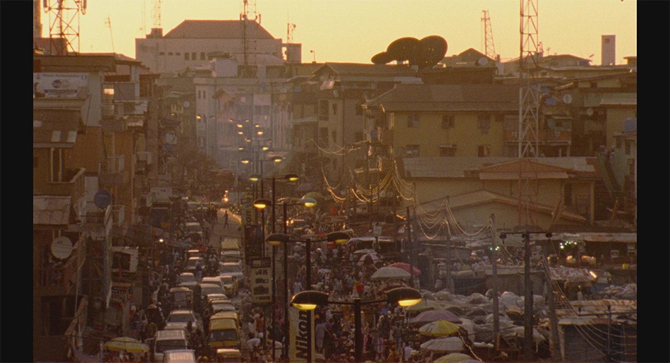 Picture taken at dusk of the busy city of Lagos, Nigeria with its traffic jams, sky scrapers and satellite dishes.