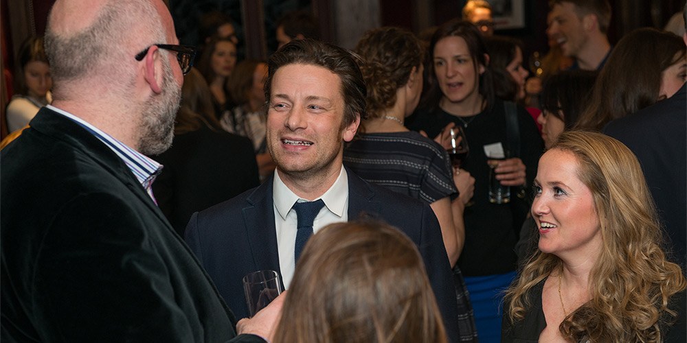 Celebrity Chef Jamie Oliver mingles with guests at the annual André Simon Awards