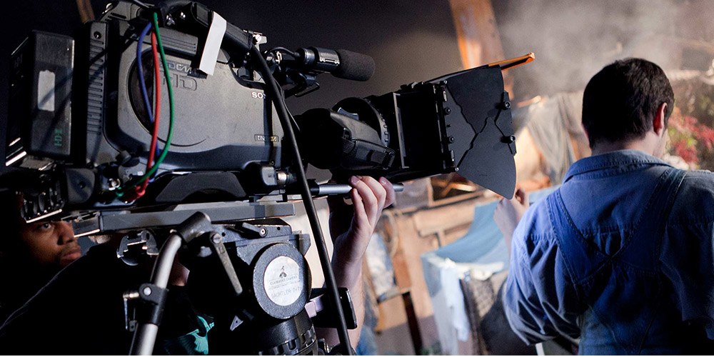 Cameraman shooting documentary