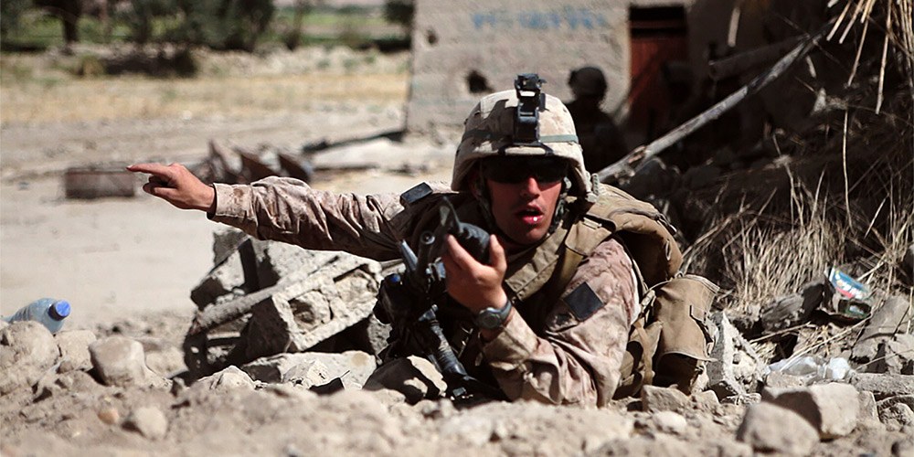 Soldier shouting orders in the field in Afghanistan