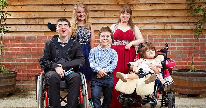 Five teenage participants photographed together