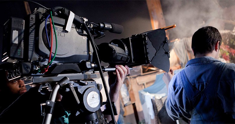 Cameraman shooting documentary