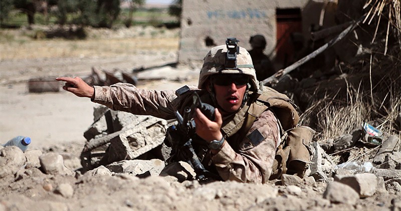 Soldier shouting orders in the field in Afghanistan