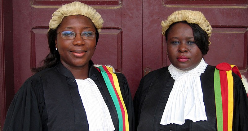 Two female lawyers from Cameroon in full legal attire